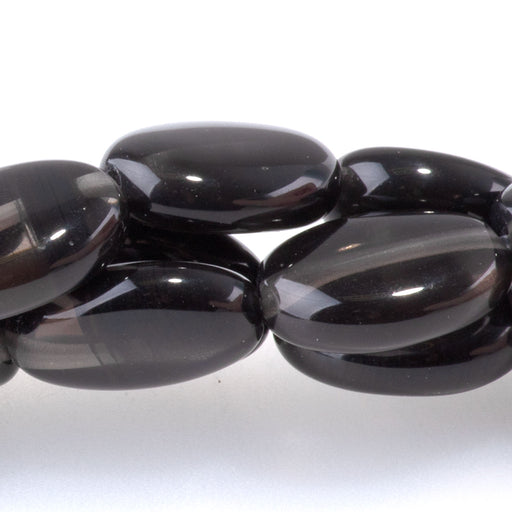 This is a Dakota Stones 10x14mm Ice Obsidian Gemstone strand with oval beads in 8 inch strand.