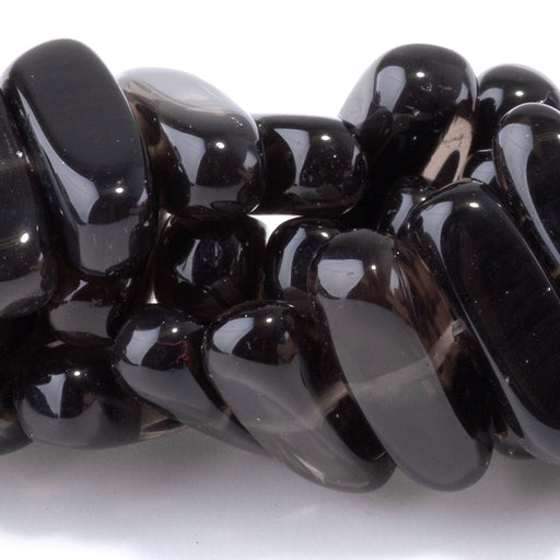 This is a Dakota Stones 5x15mm Ice Obsidian Gemstone strand with chip beads in 8 inch strand.