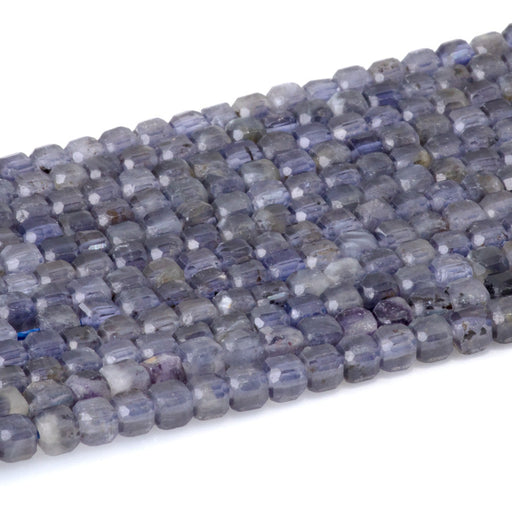 This is a Dakota Stones 4mm Iolite Gemstone strand with natural A grade table-cut cube beads in 15-16 inch strand.
