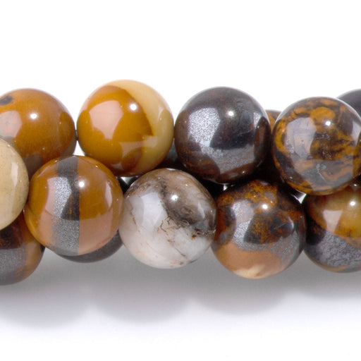 This is a Dakota Stones 8mm Iron Zebra Jasper Gemstone strand with round beads in 15-16 inch strand.
