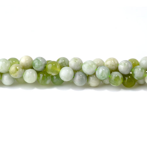 This is a Dakota Stones 10mm Green White Jade Gemstone strand with round beads in 15-16 inch strand.
