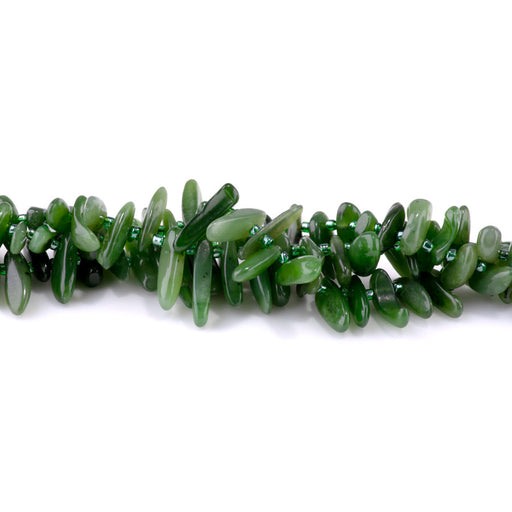 This is a Dakota Stones 5x10-20mm Canadien Jade Top Drill Teeth Gemstone strand of round beads in 15-16 inch strand.