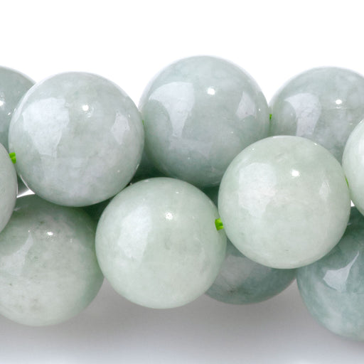 This is a Dakota Stones 10mm Jadite Gemstone strand with A grade round beads in 15-16 inch strand.