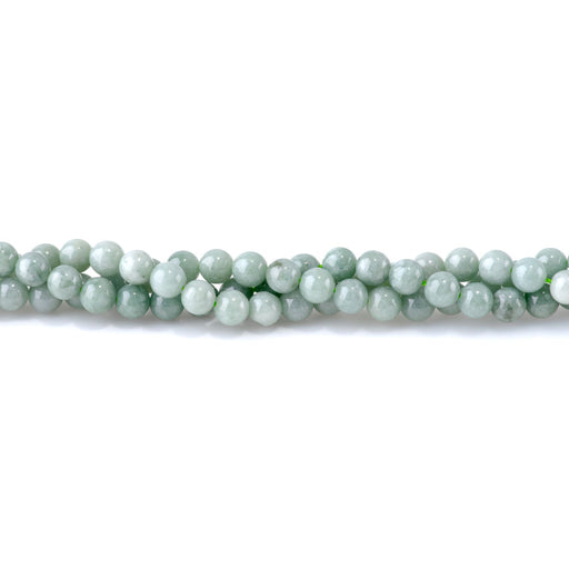 This is a Dakota Stones 6mm Jadeite Gemstone strand with round beads in 15-16 inch strand.
