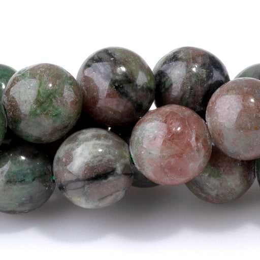 This is a Dakota Stones 8mm Kashgar Garnet Gemstone strand with round beads in 15-16 inch strand.