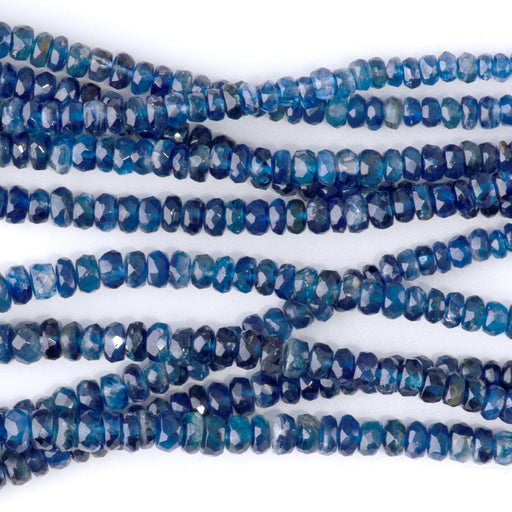 This is a Dakota Stones 2x4-3x5mm Blue Nepal Kyanite Necklace Gemstone strand with faceted rondelle beads in 15-16 inch strand.