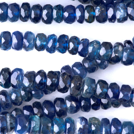 This is a Dakota Stones 2x4-3x5mm Blue Nepal Kyanite Necklace Gemstone strand with faceted rondelle beads in 15-16 inch strand.