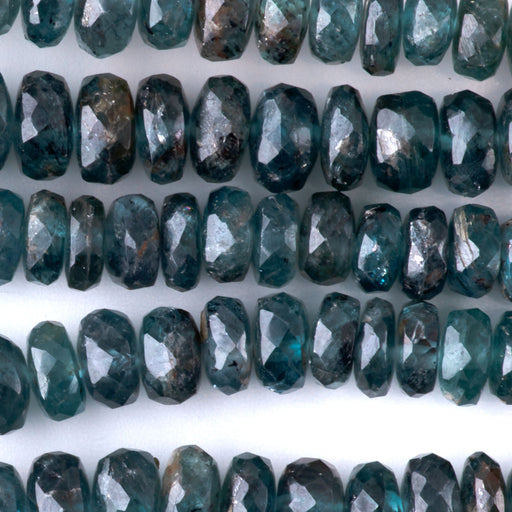 This is a Dakota Stones 2x5-5x8mm Moss Kyanite Necklace Gemstone strand with faceted rondelle beads in 15-16 inch strand.