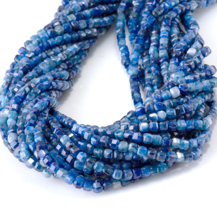 This is a Dakota Stones 3mm Blue Kyanite Gemstone strand with A grade table-cut cube beads in 15-16 inch strand.