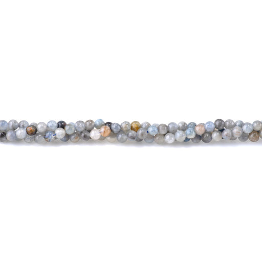 This is a Dakota Stones 4mm Kyanite Gemstone strand with round beads in 15-16 inch strand.