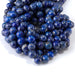 This is a Dakota Stones 10mm Lapis Gemstone strand with round beads in 15-16 inch strand.