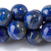 This is a Dakota Stones 10mm Lapis Gemstone strand with round beads in 15-16 inch strand.