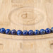 This is a Dakota Stones 10mm Lapis Gemstone strand with round beads in 15-16 inch strand.