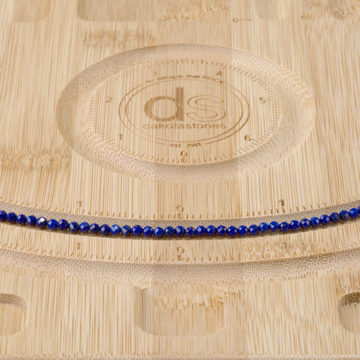 This is a Dakota Stones 3mm Lapis Gemstone strand with AAA grade faceted round beads in 15-16 inch strand.