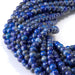 This is a Dakota Stones 4mm Lapis Gemstone strand with round beads.