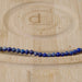 This is a Dakota Stones 4mm Lapis Gemstone strand with round beads.