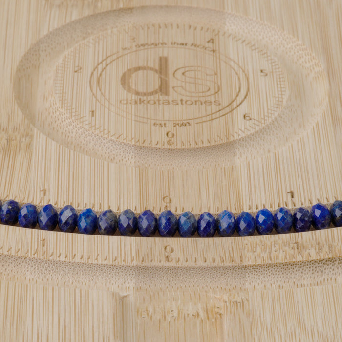 This is a Dakota Stones 4x6mm Lapis Gemstone strand with faceted rondelle beads in 15-16 inch strand.