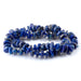 This is a Dakota Stones 5x8mm Lapis Gemstone strand with chip beads in 15-16 inch strand.