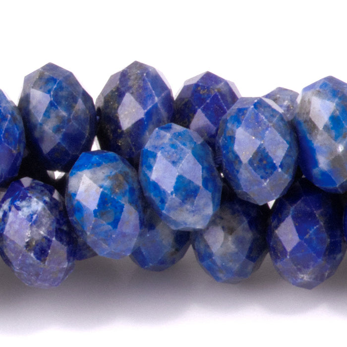 This is a Dakota Stones 5x8mm Lapis Gemstone strand with faceted rondelle beads in 15-16 inch strand.