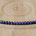 This is a Dakota Stones 5x8mm Lapis Gemstone strand with faceted rondelle beads in 15-16 inch strand.