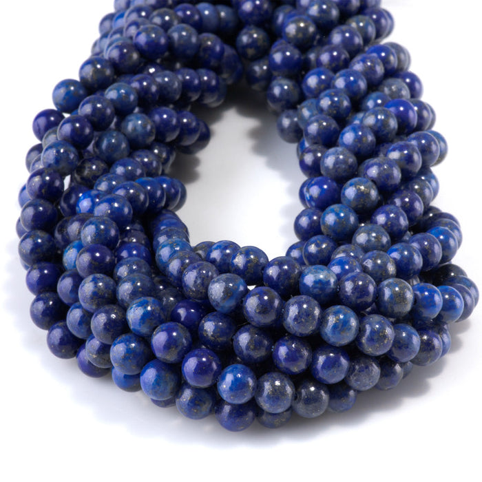 This is a Dakota Stones 6mm Lapis Gemstone strand with round beads in 15-16 inch strand.