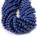 This is a Dakota Stones 6mm Lapis Gemstone strand with AAA grade round beads in 15-16 inch strand.