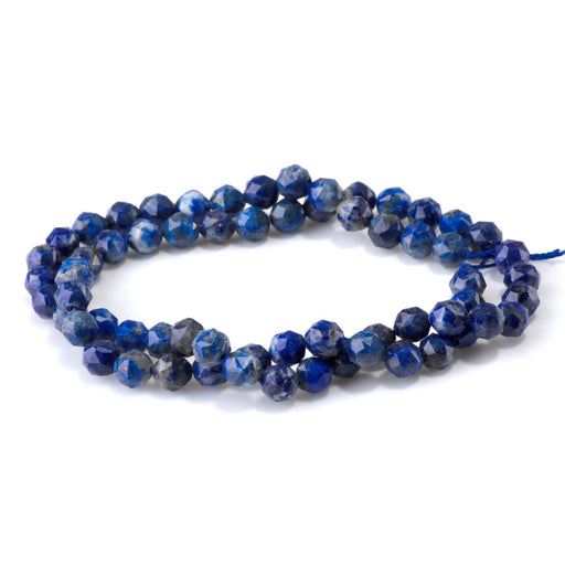 This is a Dakota Stones 6mm Lapis Gemstone strand with double heart faceted round beads in 15-16 inch strand.