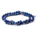 This is a Dakota Stones 6mm Lapis Gemstone strand with double heart faceted round beads in 15-16 inch strand.