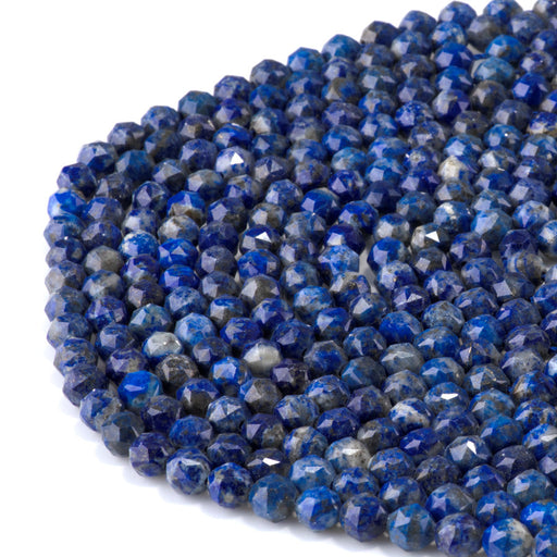 This is a Dakota Stones 6mm Lapis Gemstone strand with double heart faceted round beads in 15-16 inch strand.