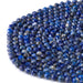 This is a Dakota Stones 6mm Lapis Gemstone strand with double heart faceted round beads in 15-16 inch strand.