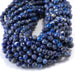 This is a Dakota Stones 6mm Lapis Gemstone strand with double heart faceted round beads in 15-16 inch strand.
