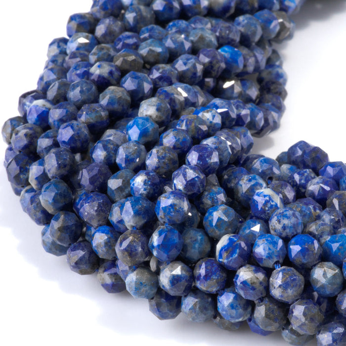 This is a Dakota Stones 6mm Lapis Gemstone strand with double heart faceted round beads in 15-16 inch strand.