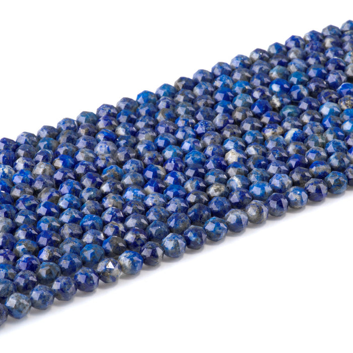 This is a Dakota Stones 6mm Lapis Gemstone strand with double heart faceted round beads in 15-16 inch strand.