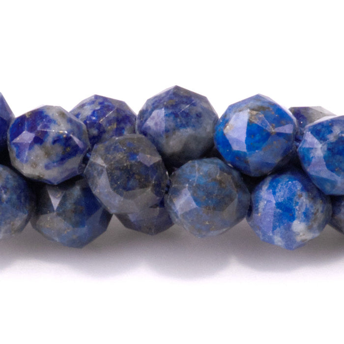 This is a Dakota Stones 6mm Lapis Gemstone strand with double heart faceted round beads in 15-16 inch strand.