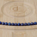 This is a Dakota Stones 6mm Lapis Gemstone strand with round beads in 15-16 inch strand.