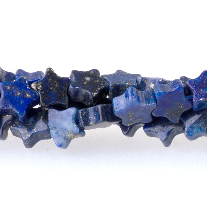This is a Dakota Stones 6mm Lapis Gemstone strand with star beads in 15-16 inch strand.