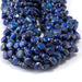 This is a Dakota Stones 8mm Lapis Gemstone strand with star cut faceted coin beads in 15-16 inch strand.