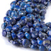 This is a Dakota Stones 8mm Lapis Gemstone strand with star cut faceted coin beads in 15-16 inch strand.