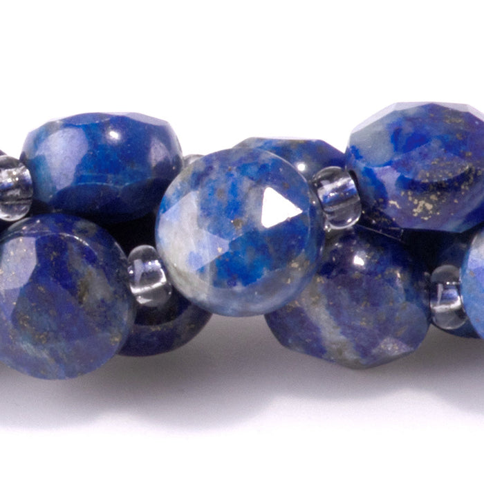 This is a Dakota Stones 8mm Lapis Gemstone strand with star cut faceted coin beads in 15-16 inch strand.