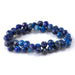 This is a Dakota Stones 8mm Lapis Gemstone strand with double heart faceted round beads in 15-16 inch strand.
