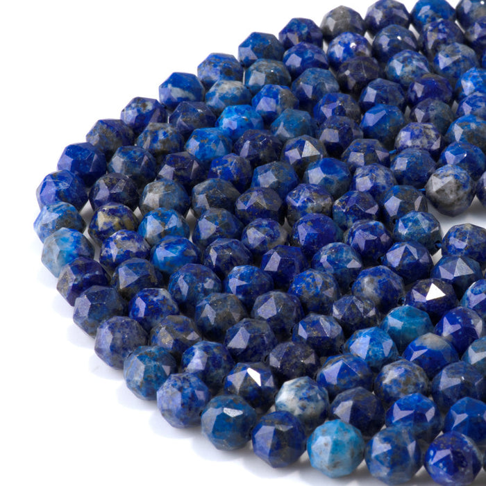 This is a Dakota Stones 8mm Lapis Gemstone strand with double heart faceted round beads in 15-16 inch strand.