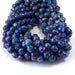 This is a Dakota Stones 8mm Lapis Gemstone strand with double heart faceted round beads in 15-16 inch strand.