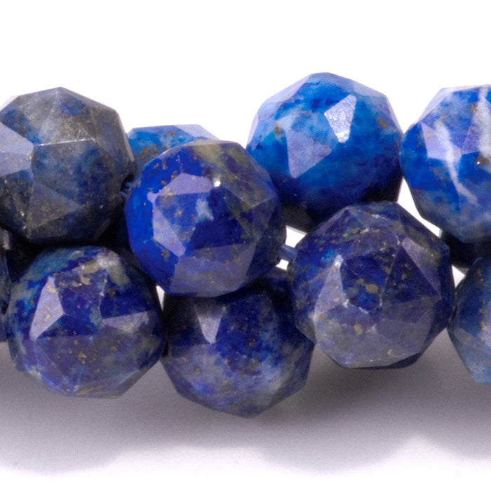This is a Dakota Stones 8mm Lapis Gemstone strand with double heart faceted round beads in 15-16 inch strand.