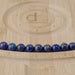 This is a Dakota Stones 8mm Lapis Gemstone strand with round beads in 15-16 inch strand.