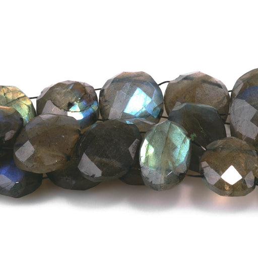 This is a Dakota Stones 10x14-12x18mm Labradorite Double Drill Gemstone strand with faceted irregular oval beads in 10 inch strand.