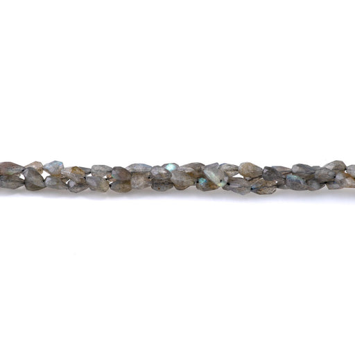 This is a Dakota Stones 7x5-9mm Labradorite Long Drill Gemstone strand with faceted drop beads in 8 inch strand.