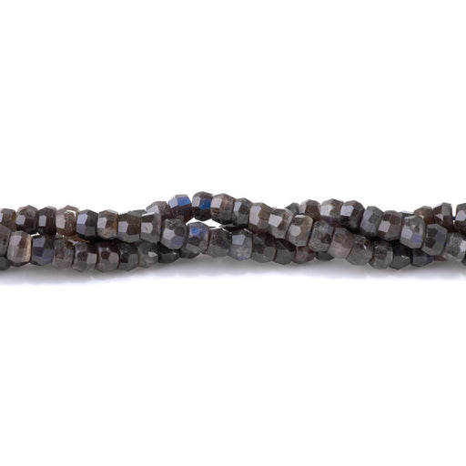 This is a Dakota Stones 5x7mm Dark Red Labradorite Irr Gemstone strand with AA grade faceted rondelle beads in 15-16 inch strand.