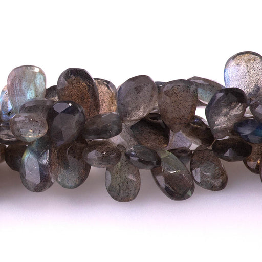 This is a Dakota Stones 6x8-8x11mm Labradorite Pear Gemstone strand with faceted irregular beads in 8 inch strand.