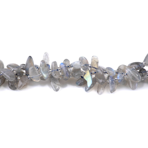 This is a Dakota Stones 6x12-10x20mm Labradorite Dancing Drops Gemstone strand with A grade free-form beads in 15-16 inch strand.