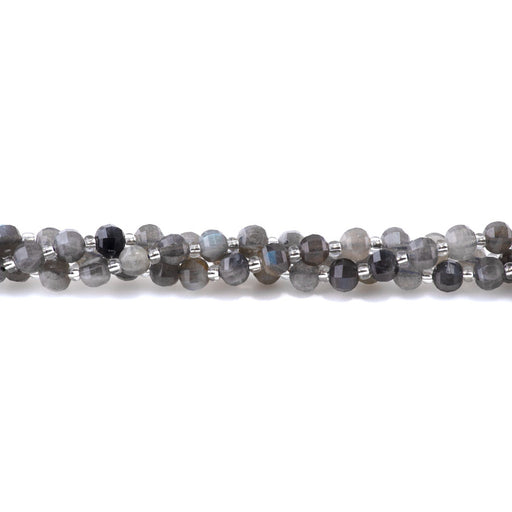 This is a Dakota Stones 6mm Labradorite Lantern Gemstone strand with A grade faceted beads in 15-16 inch strand.